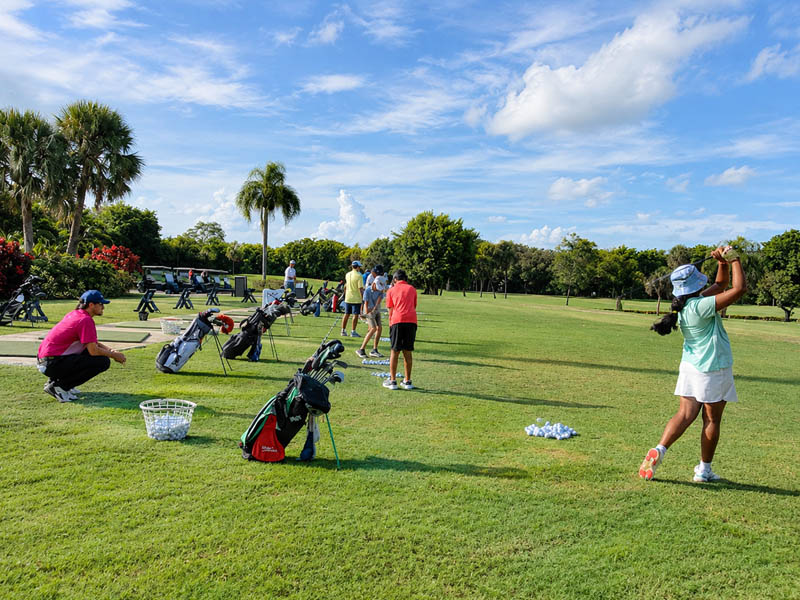 Junior golfers on the course at Boca Raton Golf & Racquet Club